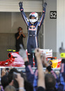 A delighted Sebastian Vettel acknowledges the applause