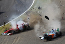 Tonio Liuzzi's Force India disintegrates after being hit by Felipe Massa
