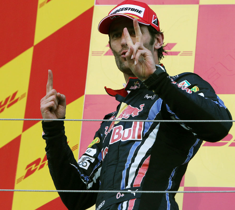 Mark Webber celebrates his podium finish