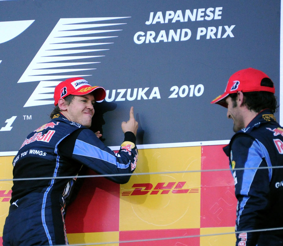 Sebastian Vettel shows team-mate Mark Webber who is number one in Suzuka