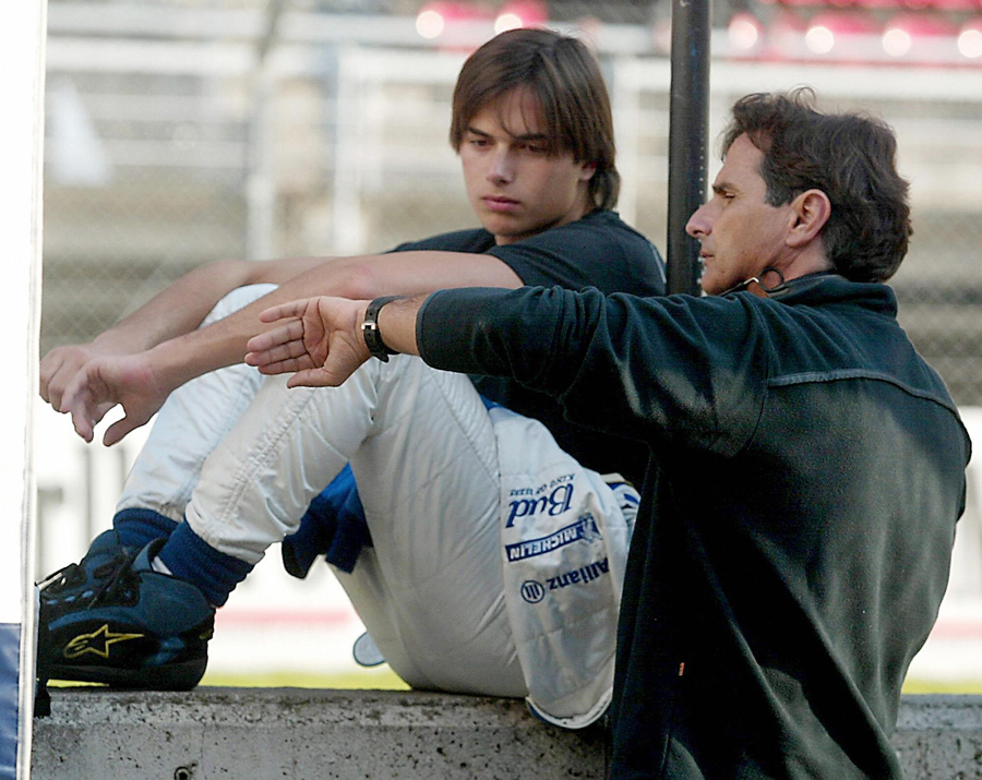 Nelson Piquet and his son chat