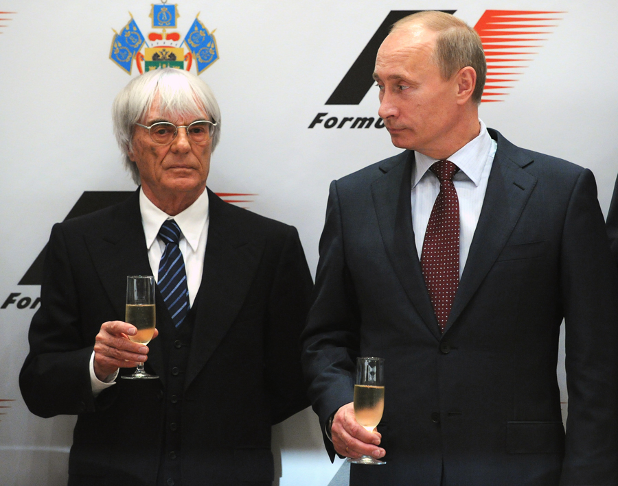 Bernie Ecclestone and Russian Prime Minister Vladimir Putin attend a ceremony
