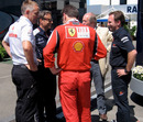 Team bosses meet in the paddock