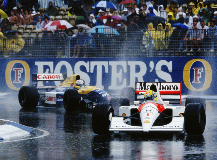 Ayrton Senna leads Nigel Mansell at the 14-lap Australian Grand Prix