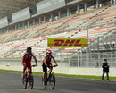 Fernando Alonso cycles the circuit for the first time