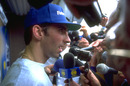 Damon Hill speaks to the media after failing to win the world title
