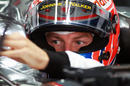Jenson Button prepares to drive on the new track for the first time during practice 
