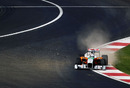 Adrian Sutil uses all the track through the final corner