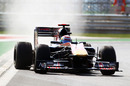 Sebastien Buemi kicks up dust in his Toro Rosso