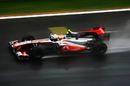 Lewis Hamilton picks his way through the wet