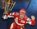 Fernando Alonso with his winner's trophy