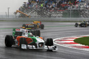 Tonio Liuzzi holds a huge slide in his Force India