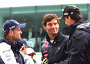 Rubens Barrichello chats with Mark Webber and Robert Kubica