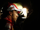 Fernando Alonso talks to the press after the race