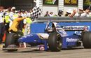 Damon Hill celebrates winning the 1995 Australian Grand Prix by a massive margin of over two laps