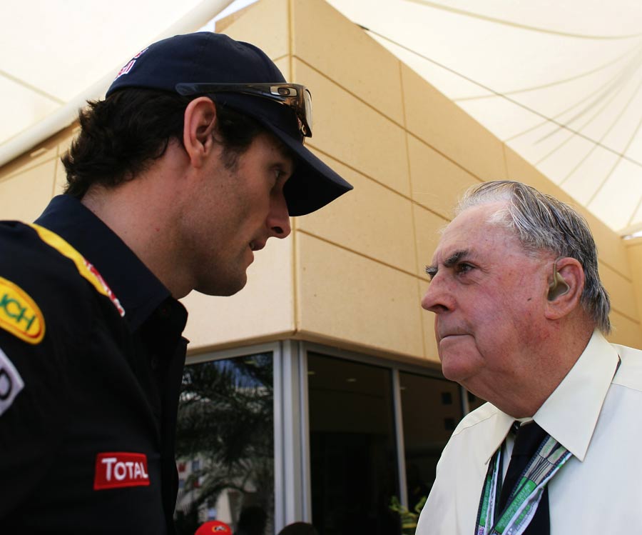 Mark Webber meets three time World Champion Jack Brabham during the Bahrain Grand Prix