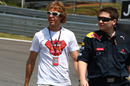 Sebastian Vettel walks the track
