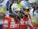 Fernando Alonso and Felipe Massa walk off together
