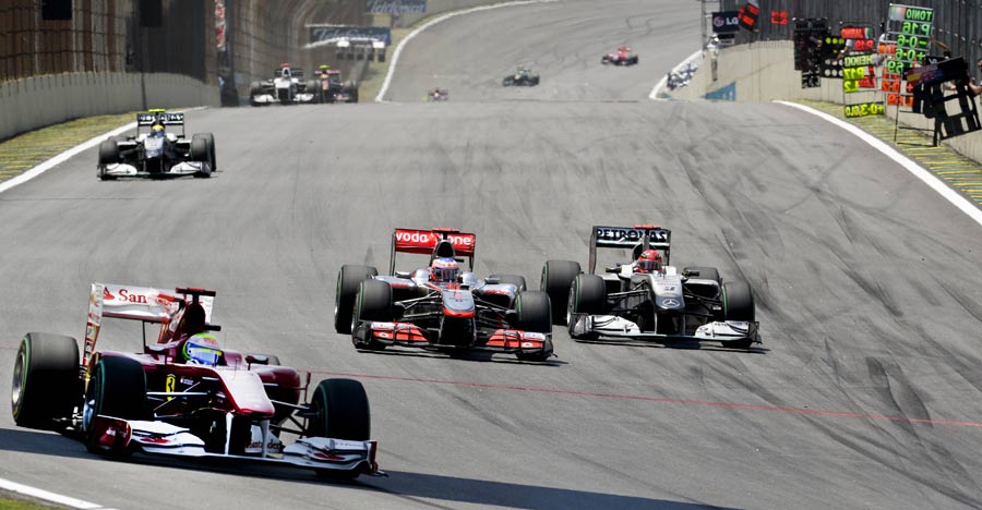 Felipe Massa leads Jenson Button and Michael Schumacher