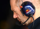 Adrian Newey watches proceedings in the Red Bull garage