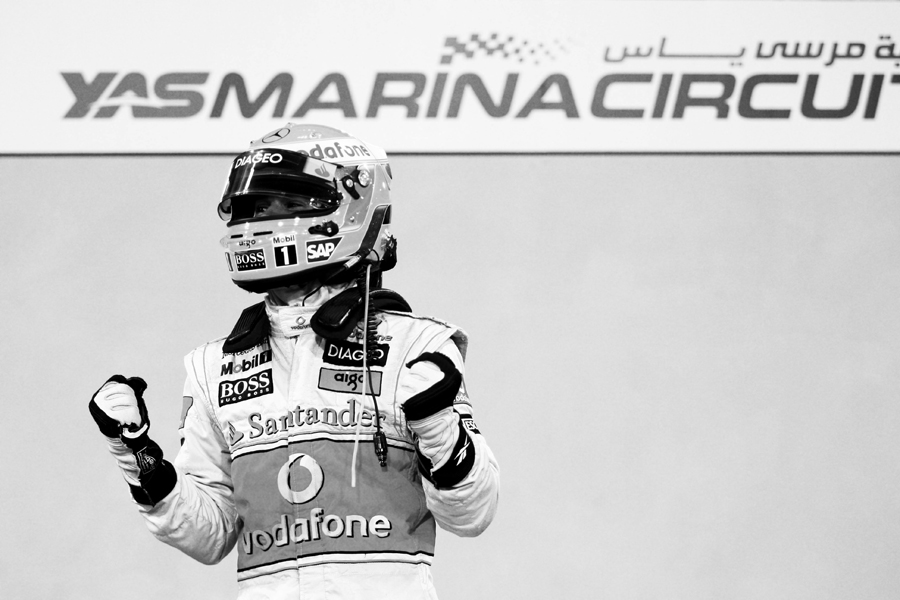 Lewis Hamilton celebrates after taking pole in Abu Dhabi