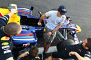 Mark Webber talks to his race engineers