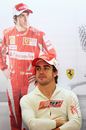 Fernando Alonso bides his time in the Ferrari pits