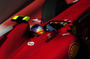 Fernando Alonso corners hard in his Ferrari