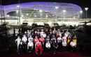 The drivers and team bosses at night