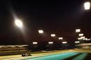Mark Webber drives under the Abu Dhabi lights