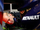 Adrian Newey inspects the rear of the Red Bull