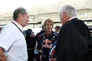 Sebastian Vettel talks to Helmut Marko and Dietrich Mateschitz at an end-of-season photoshoot