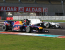 Daniel Ricciardo passes Esteban Gutierrez on track