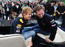 Sebastian Vettel and Christian Horner pose for a photo during a Red Bull press conference
