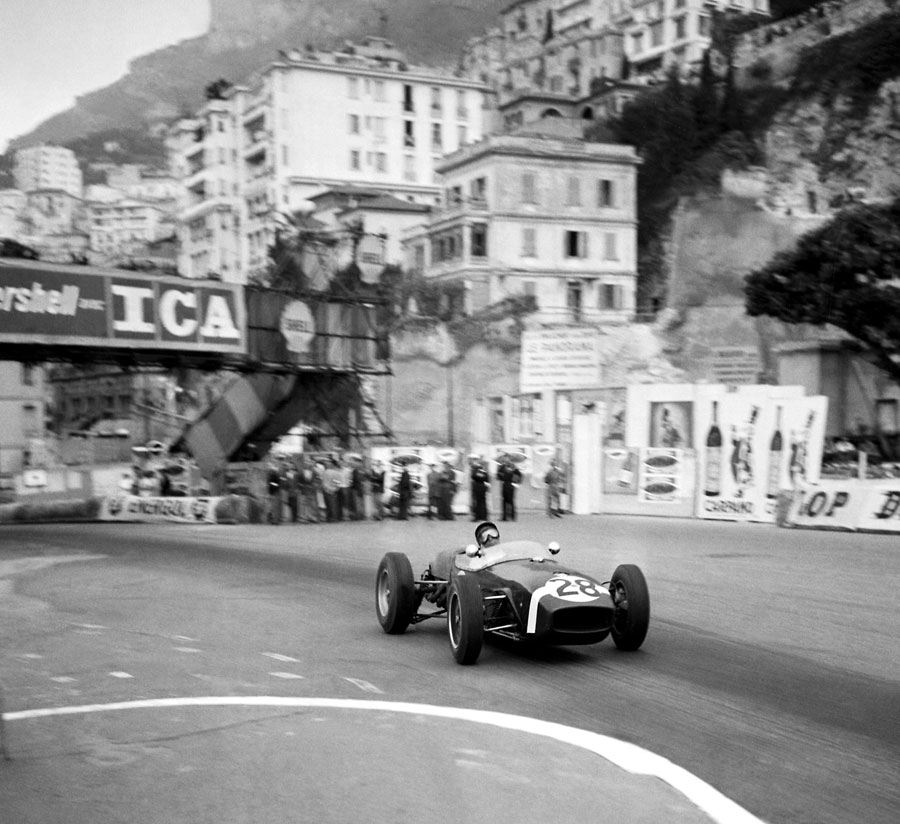 Sir Stirling Moss on his way to victory in a Rob Walker Lotus 18, the first win for the Lotus marque