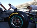 Nico Rosberg is wheeled back to the pits during the Abu Dhabi Pirelli test