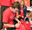Fernando Alonso signs autographs ahead of a charity race in his home town
