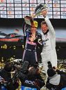 Sebastian Vettel and Michael Schumacher celebrate winning the Nations Cup at the Race of Champions