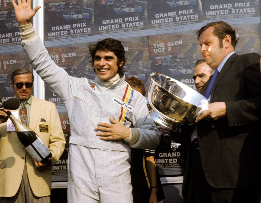 A jubilant Francois Cevert celebrates his first GP victory after the final round of the season