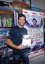 Mark Webber promotes his review of the 2010 season in Melbourne