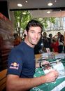 Mark Webber signs copies of his new book in Melbourne