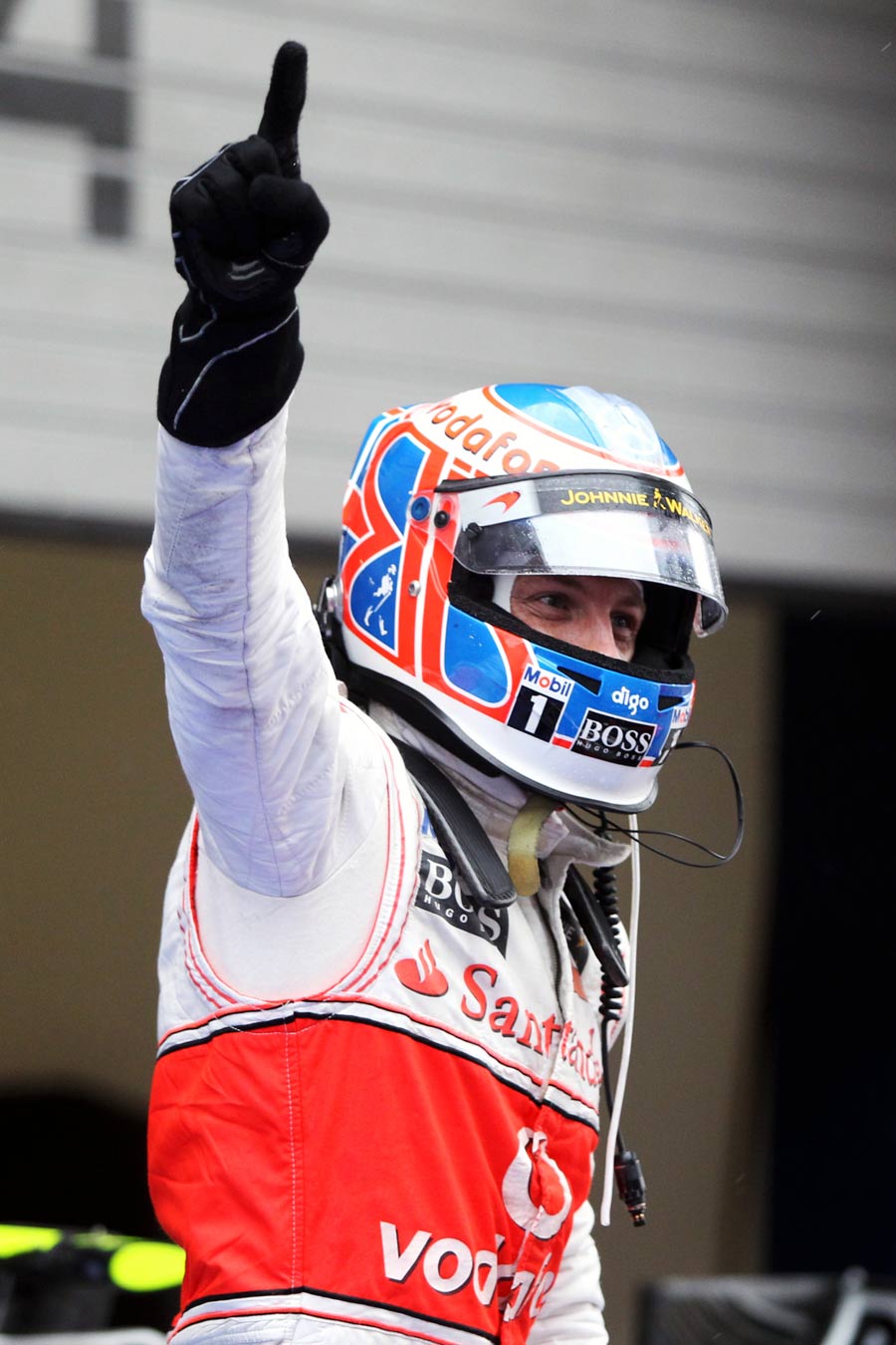 Jenson Button celebrates after his win
