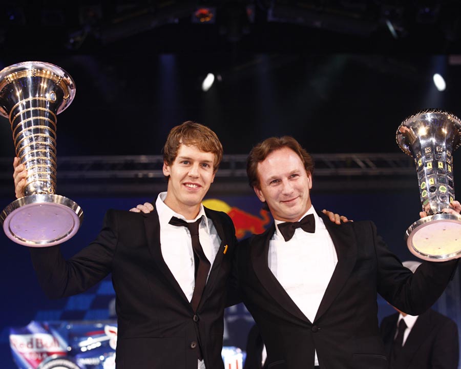 Sebastian Vettel and Christian Horner celebrate Red Bull's success