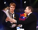 Jean Todt presents Sebastian Vettel with the drivers' trophy