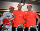Lewis Hamilton, Martin Whitmarsh and Jenson Button pose for a photo after McLaren took a 1-2 victory
