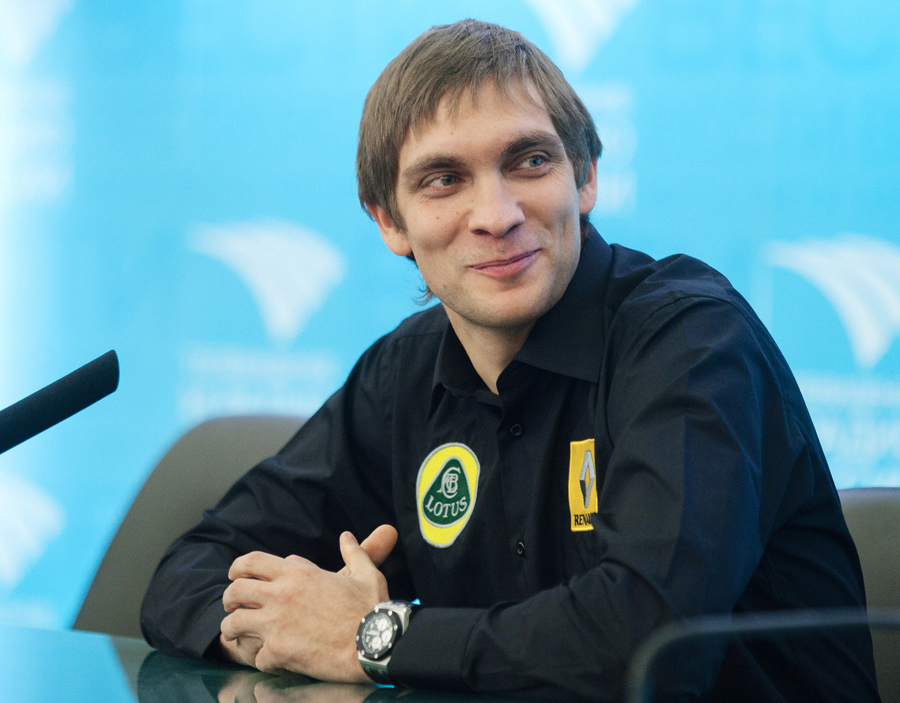 Vitaly Petrov during the press conference announcing he would keep his drive with Renault