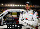 Narain Karthikeyan poses for a photo on the grid