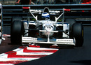 Mika Salo rides the kerbs in the distinctive Tyrrell 025 (X-Wing)