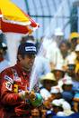 Carlos Reutemann  celebrates his victory on the podium