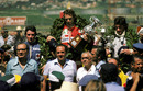 Patrick Depailler, race winner  Niki Lauda and Tom Pryce take the post-race plaudits